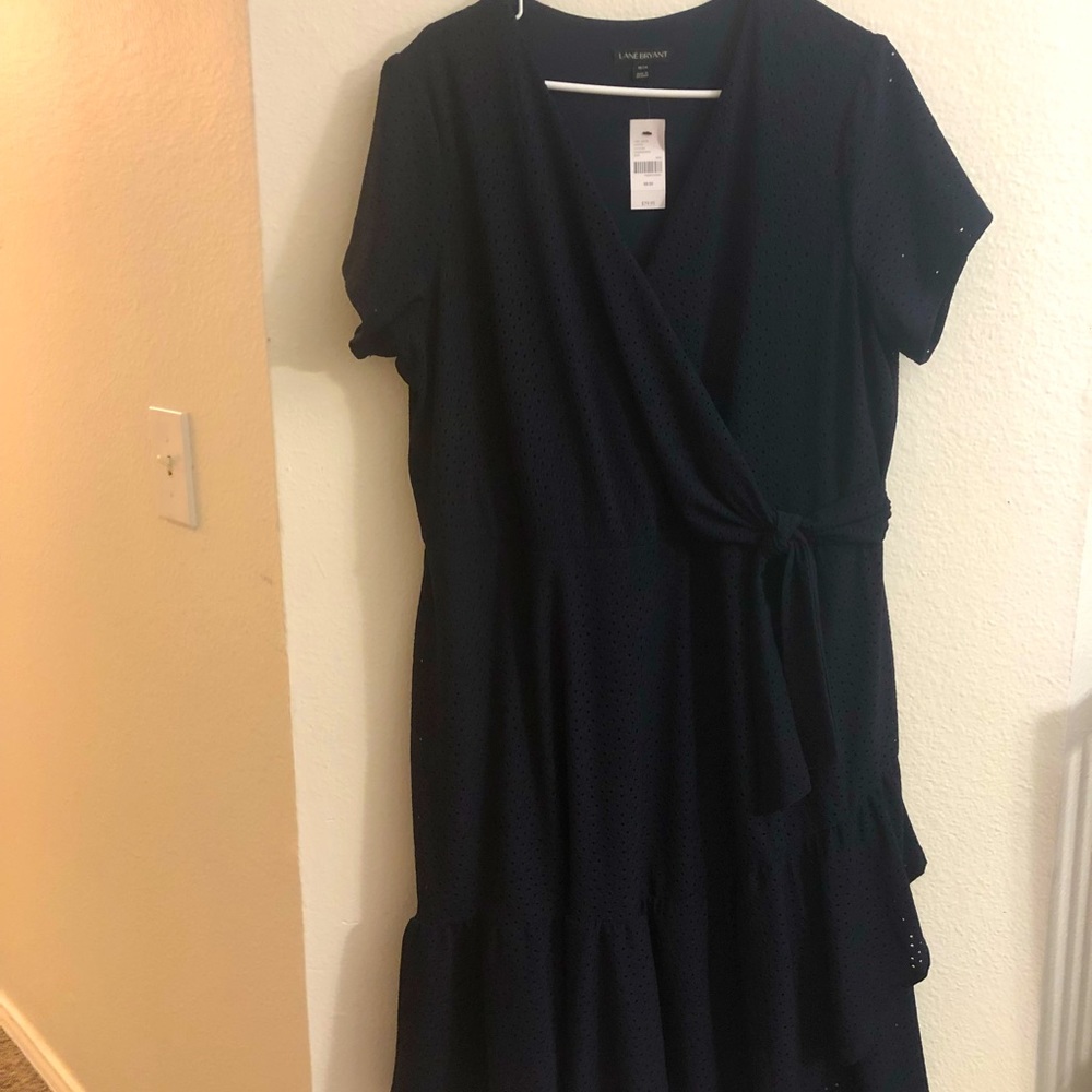 Dress with short sleeves, mock wrap and hem ruffle